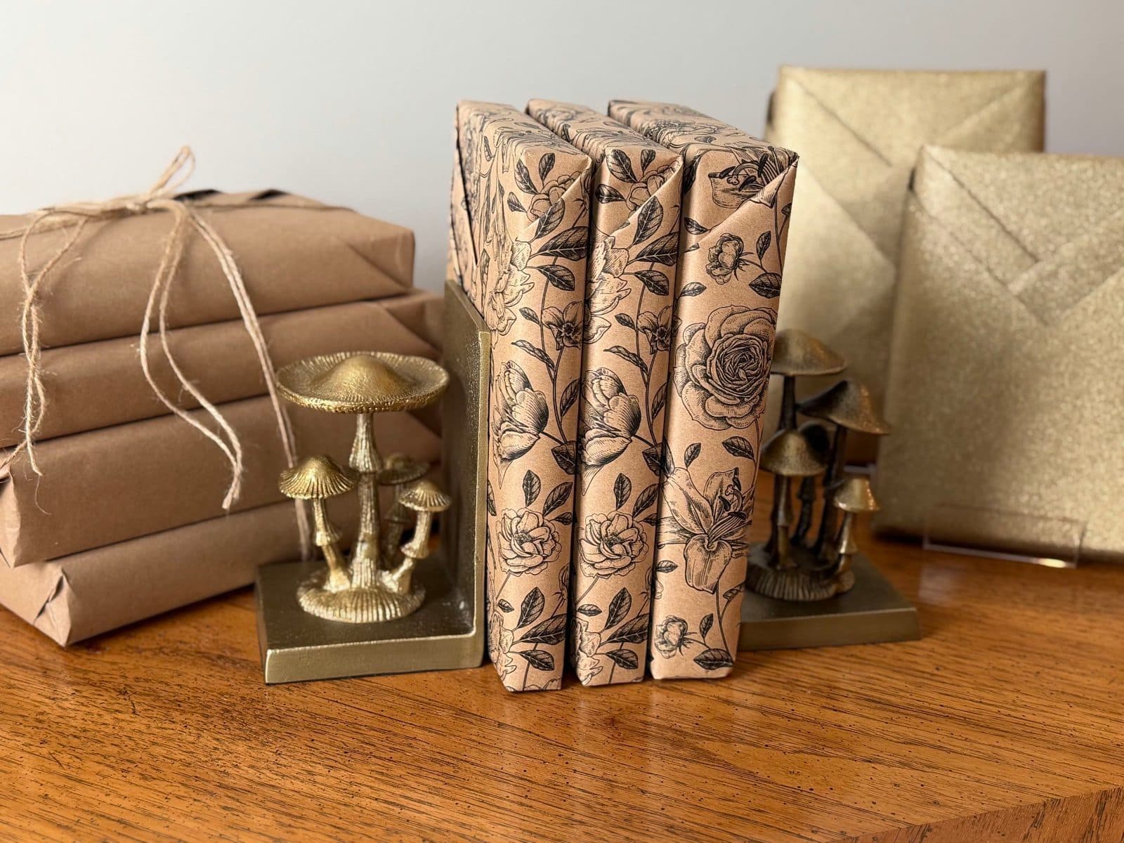 Books wrapped in paper so the covers are hidden, ready to be sent out